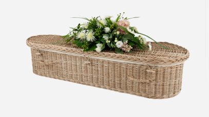 Child's willow coffin with a curved-end shape, weatherbeaten gold in colour and featuring weatherbeaten gold woven willow handles