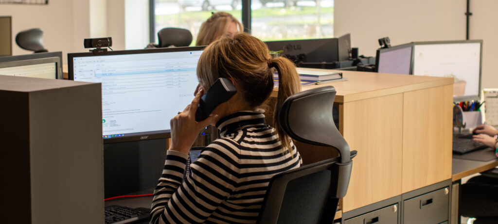 A member of staff helping a customer over the phone